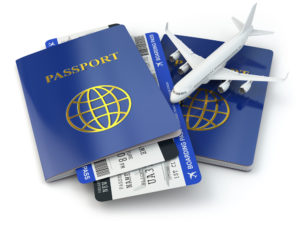 Travel concept. Passports, airline tickets and airplane.
